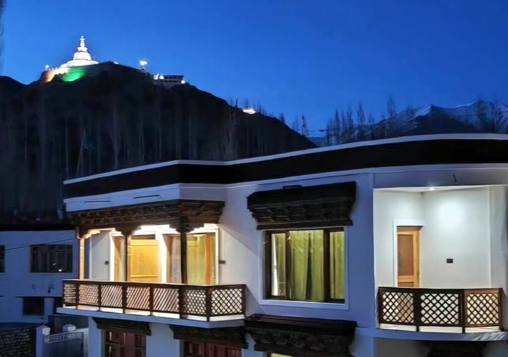 Hotel Summer Inn with Shanti Stupa in the background
